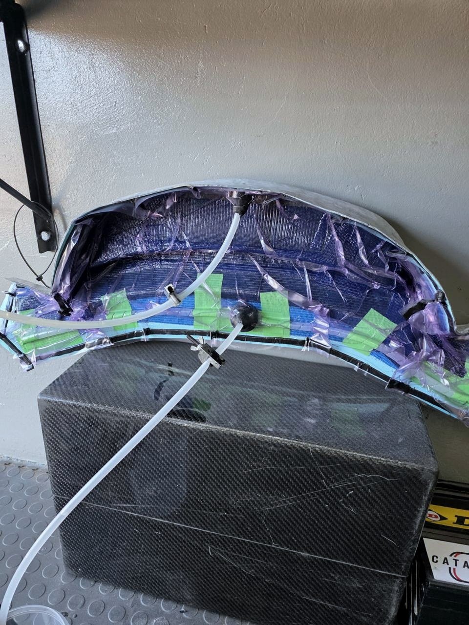 The vacuum bag laid loosely over the carbon layup in the mould.