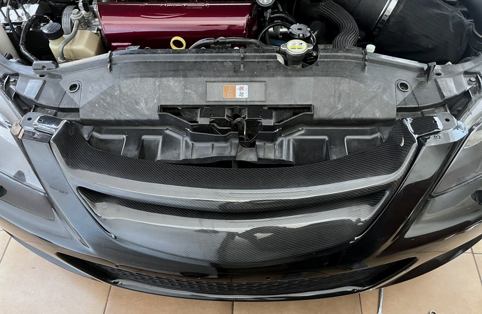 The Mazdaspeed 6 front end with the bumper removed, showing where the grille mounts.